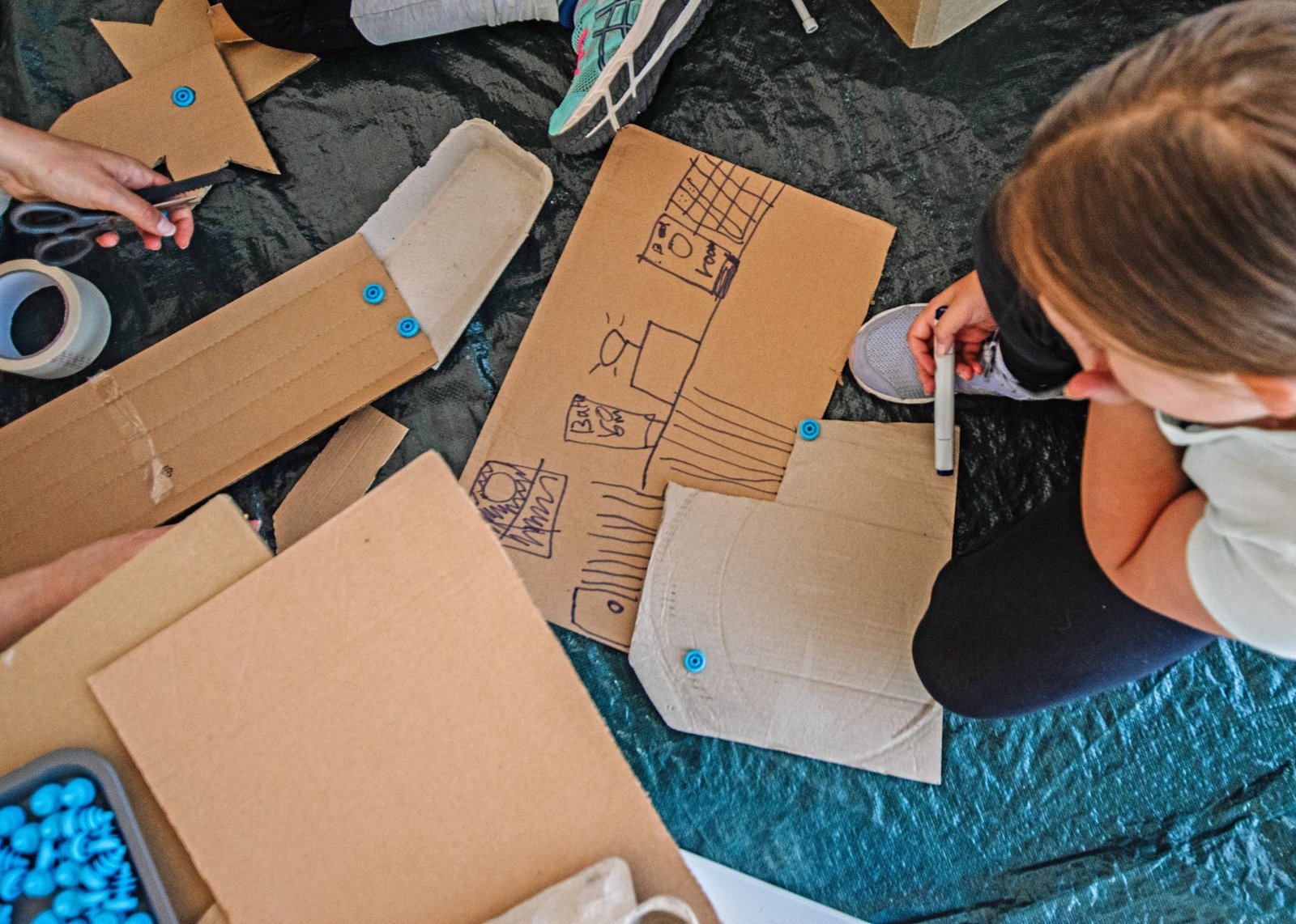 Make a cardboard construction Art. Play. Children. Learning.
